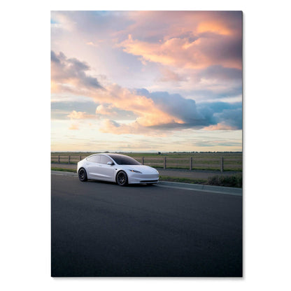 Tesla Model 3 Highland parked on road at sunset with dramatic clouds poster wall art.