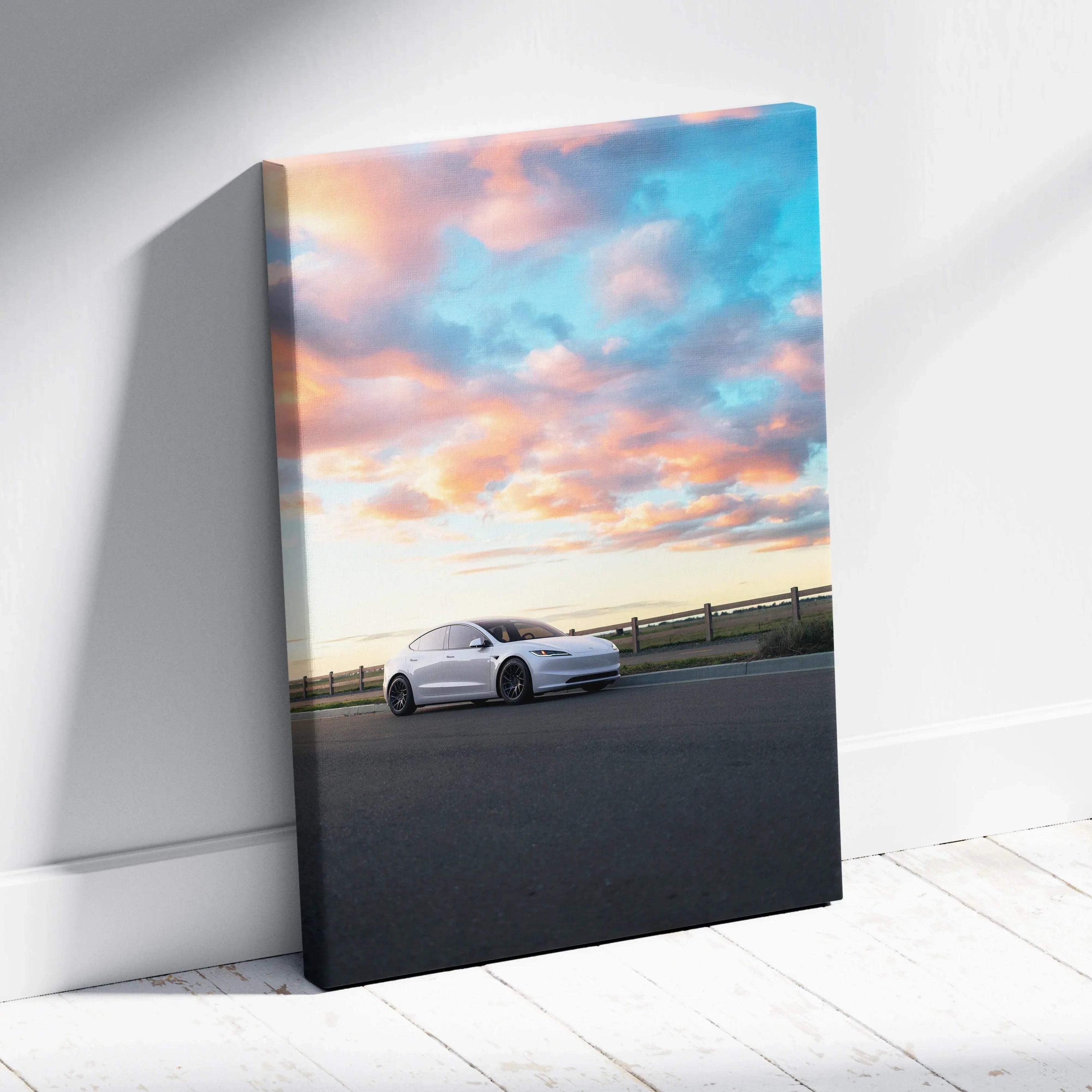 Vertical canvas wall art featuring a white Tesla Model 3 Highland under a vibrant sunset sky.