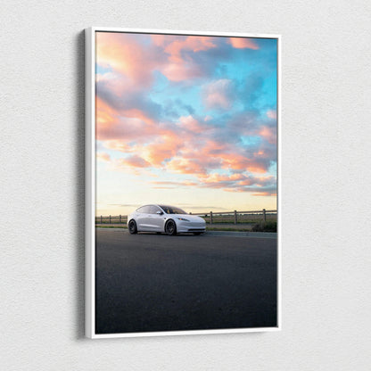 Tesla Model 3 Highland sunset canvas wall art with vibrant colorful sky and sleek white car.