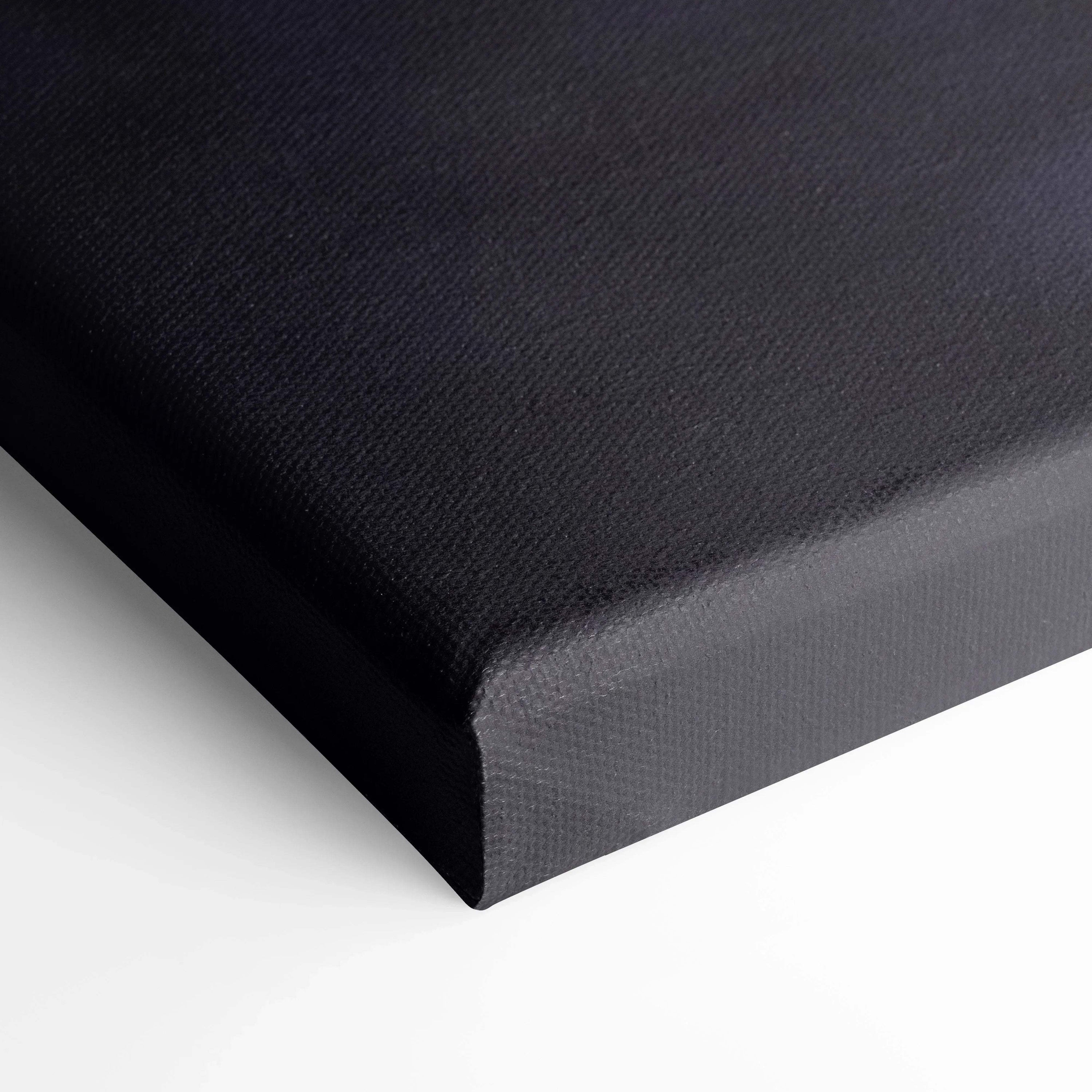 Close-up of black stretched canvas with textured surface, museum-quality vertical wall art canvas print.