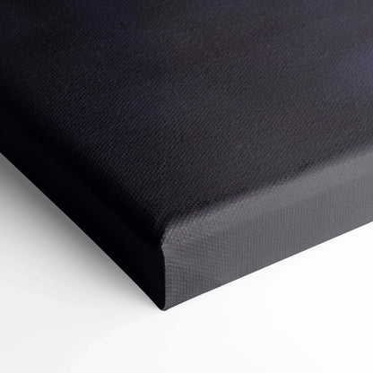 Close-up of black stretched canvas with textured surface, museum-quality vertical wall art canvas print.