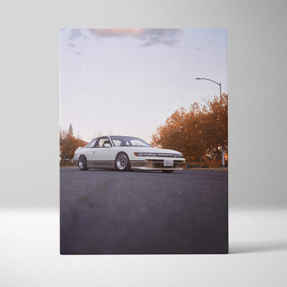 Vertical canvas art featuring a white Nissan 240sx S13 Silvia on an asphalt road with autumn trees in the background.