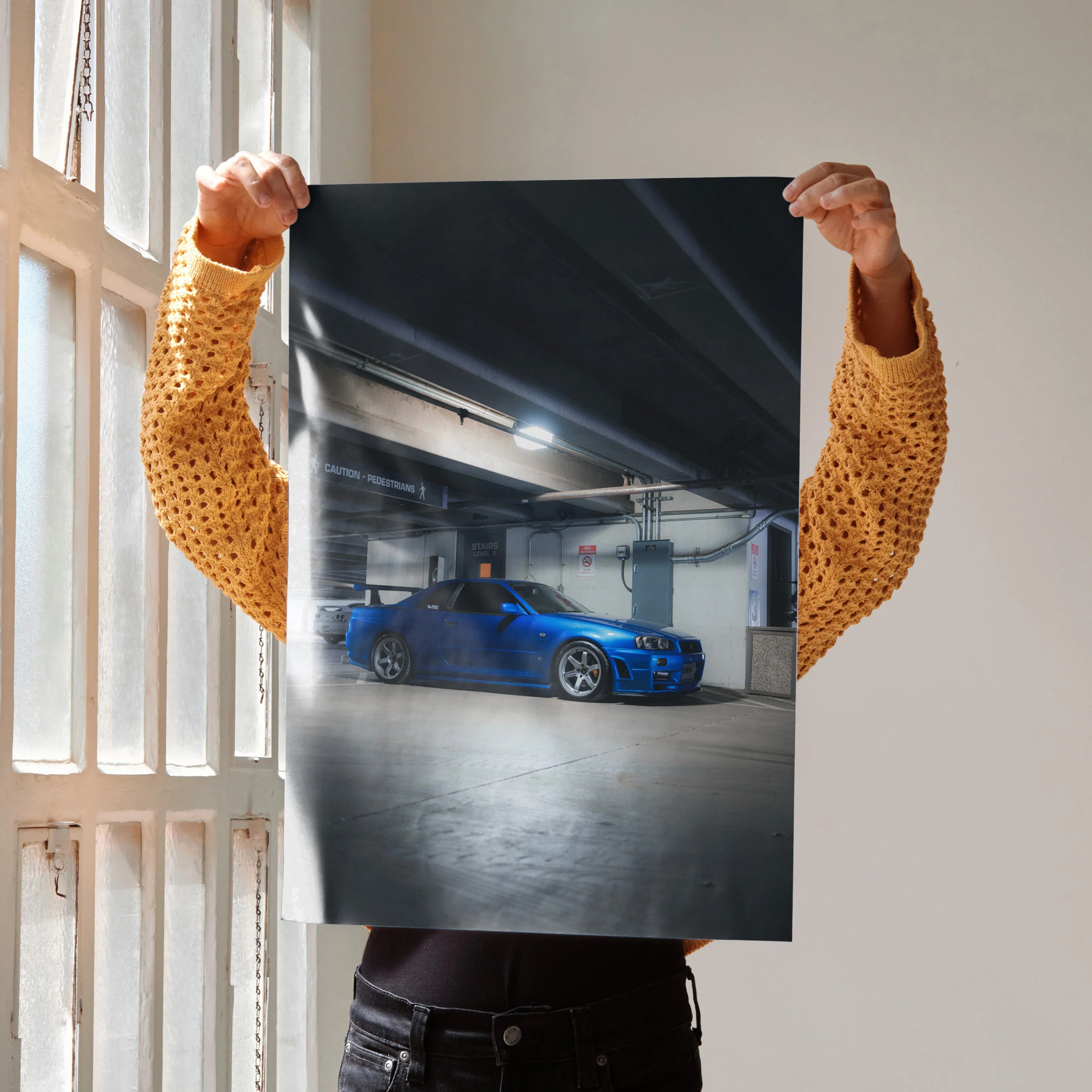 Nissan R34 GTR Skyline blue sports car poster with underground garage scene wall art.