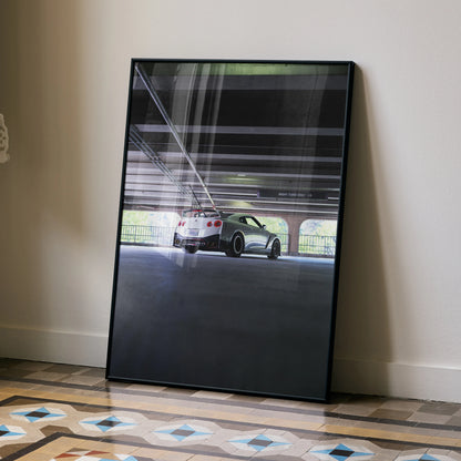 Nissan GTR R35 poster featuring a silver sports car under highway overpass, modern wall art.