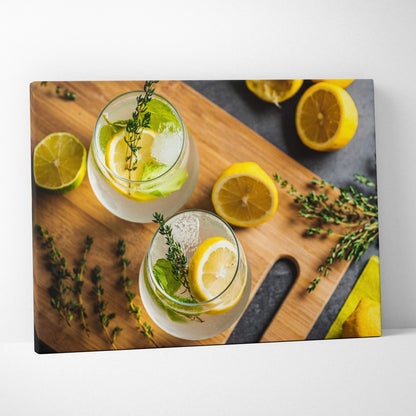 Canvas wall art featuring vibrant lemons, fresh lime slices, green herbs on a wooden cutting board with a modern, colorful.