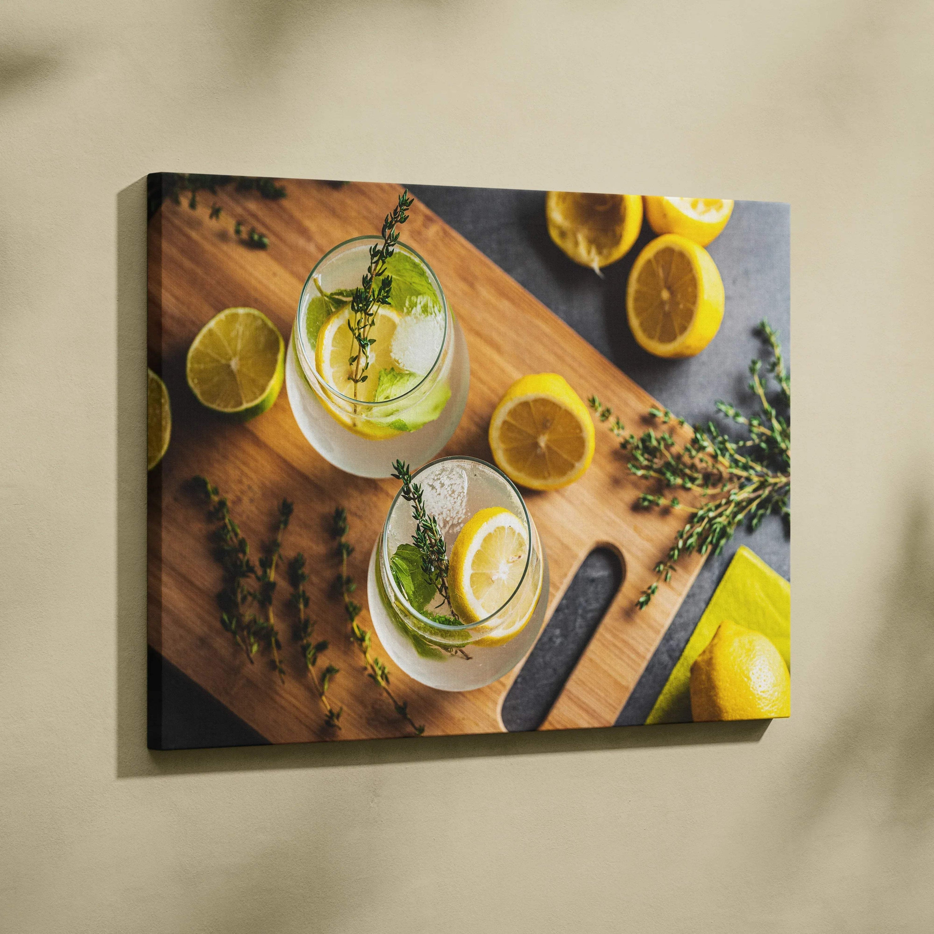Canvas wall art featuring a vibrant lemon-themed design with fresh yellow lemons and green herbs on a wooden surface.