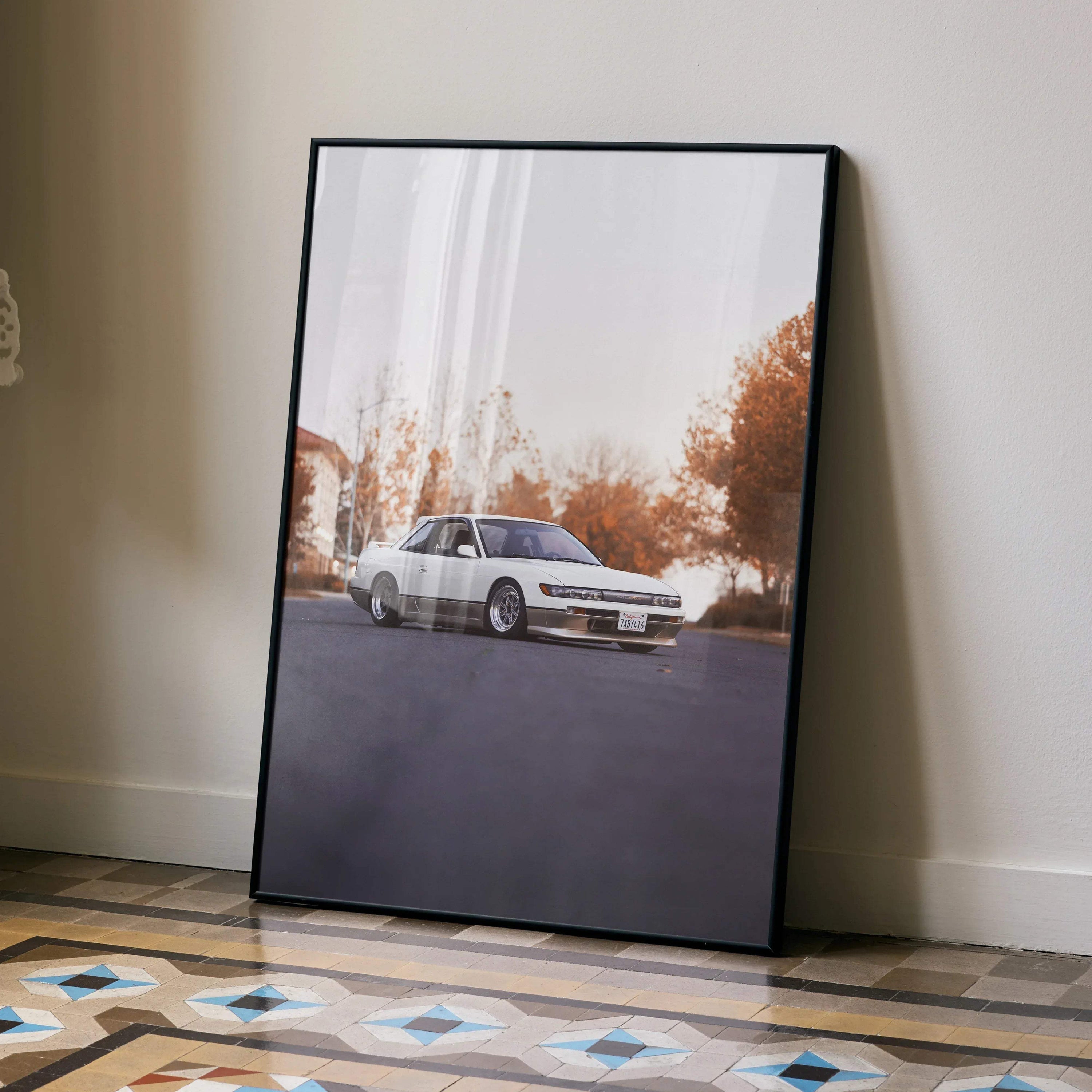 Nissan 240sx S13 Silvia poster with orange-tinted high-resolution automotive wall art in black frame.