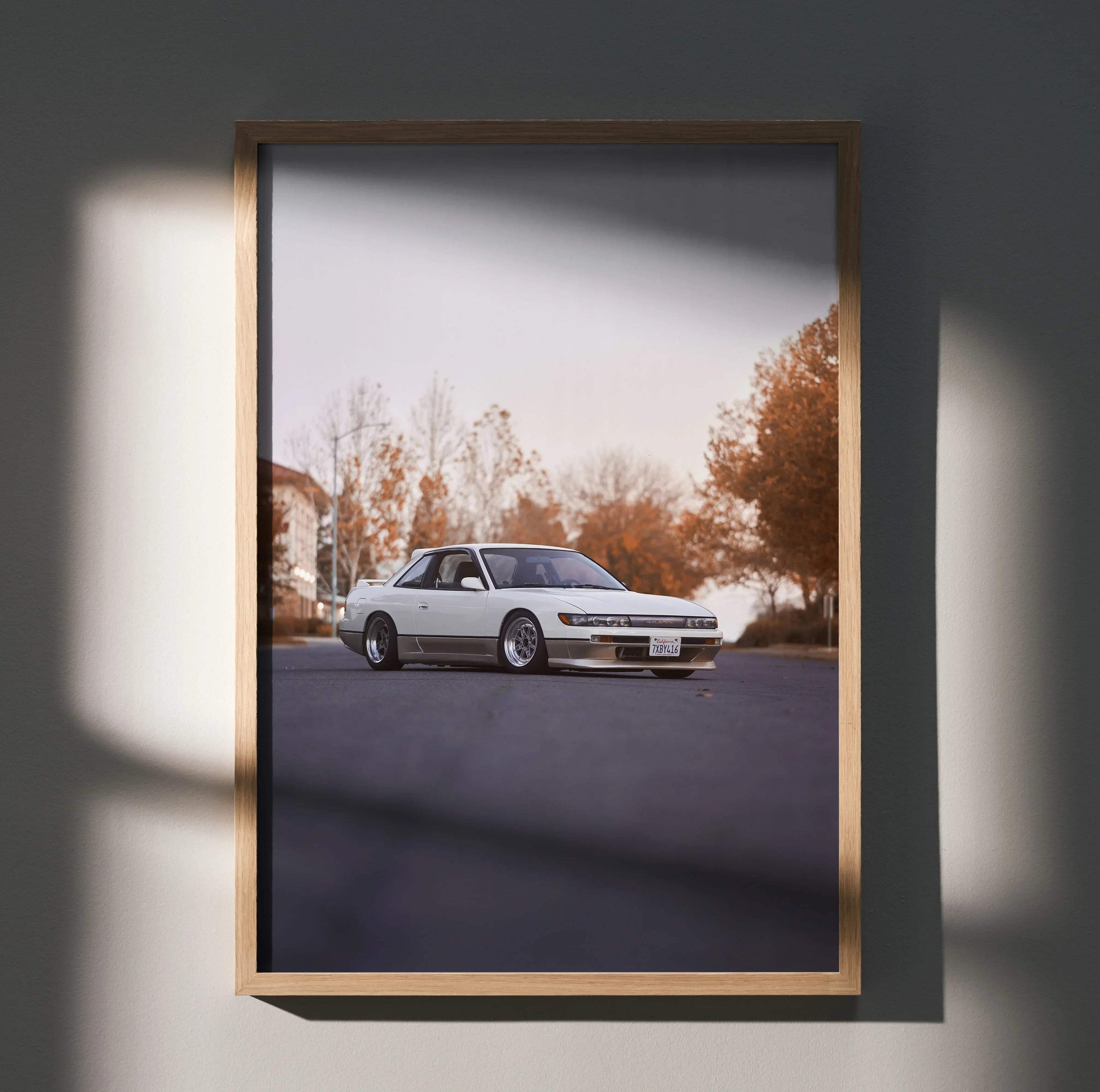 Nissan 240sx S13 Silvia parked on street autumn background poster wall art in wooden frame.