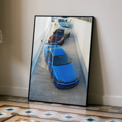 Nissan R34 GTR Skyline Poster featuring blue and purple cars in a sleek urban setting wall art.