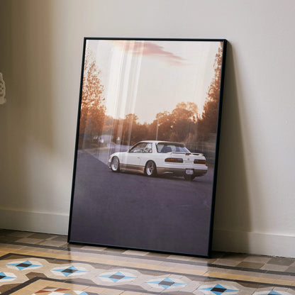 Nissan 240sx S13 Silvia poster wall art featuring rear view of white car on road at sunset.