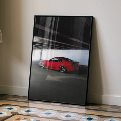 Red Nissan 300ZX Skyline poster leaning against wall, modern car wall art with dark background.