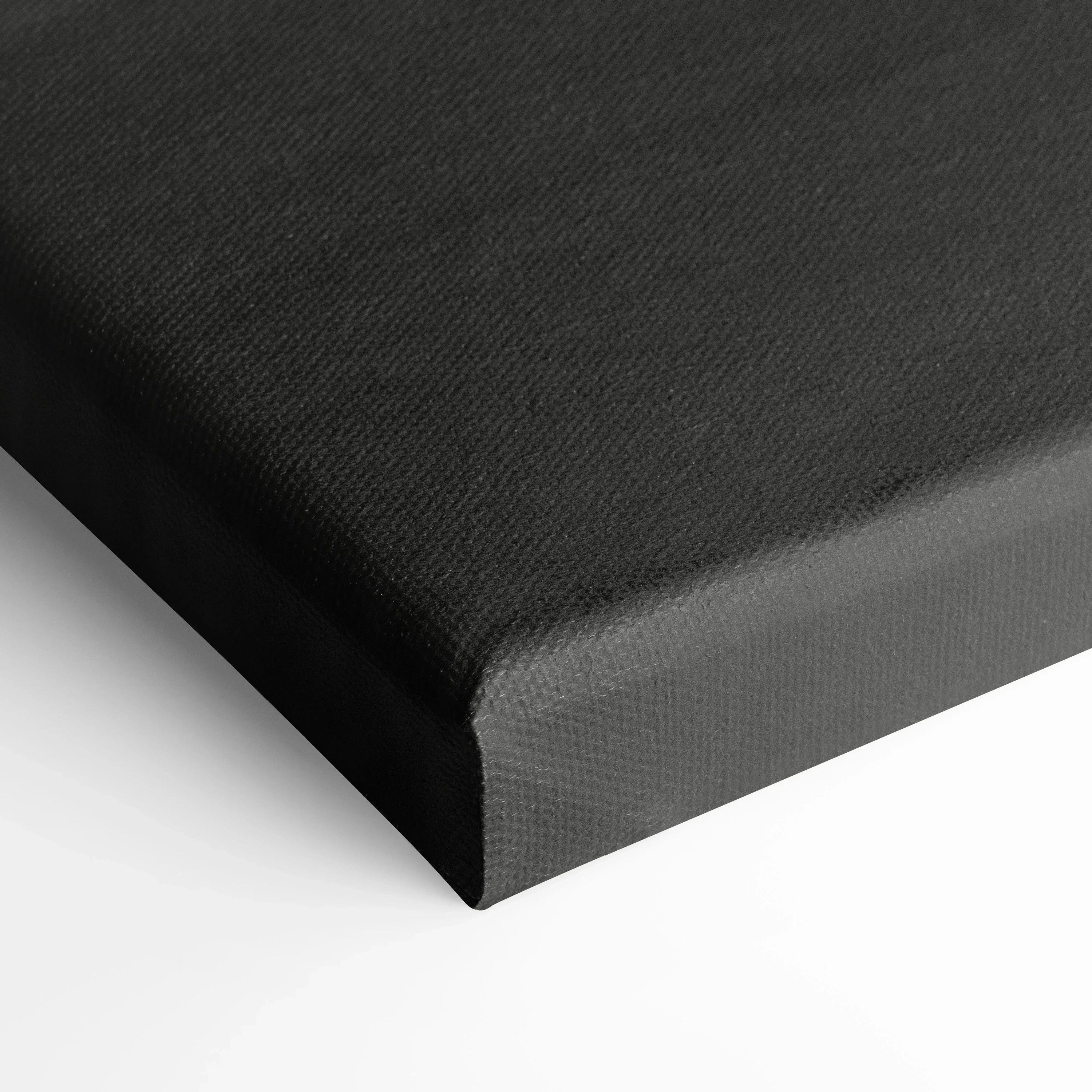 Black textured canvas corner stretched over wooden frame for wall art or canvas art display.