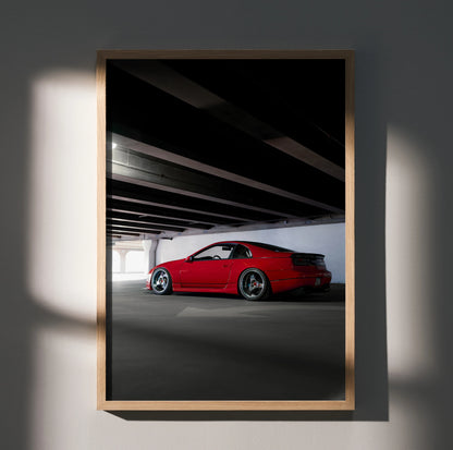 Red Nissan 300ZX parked under a bridge with dramatic shadows, poster wall art.