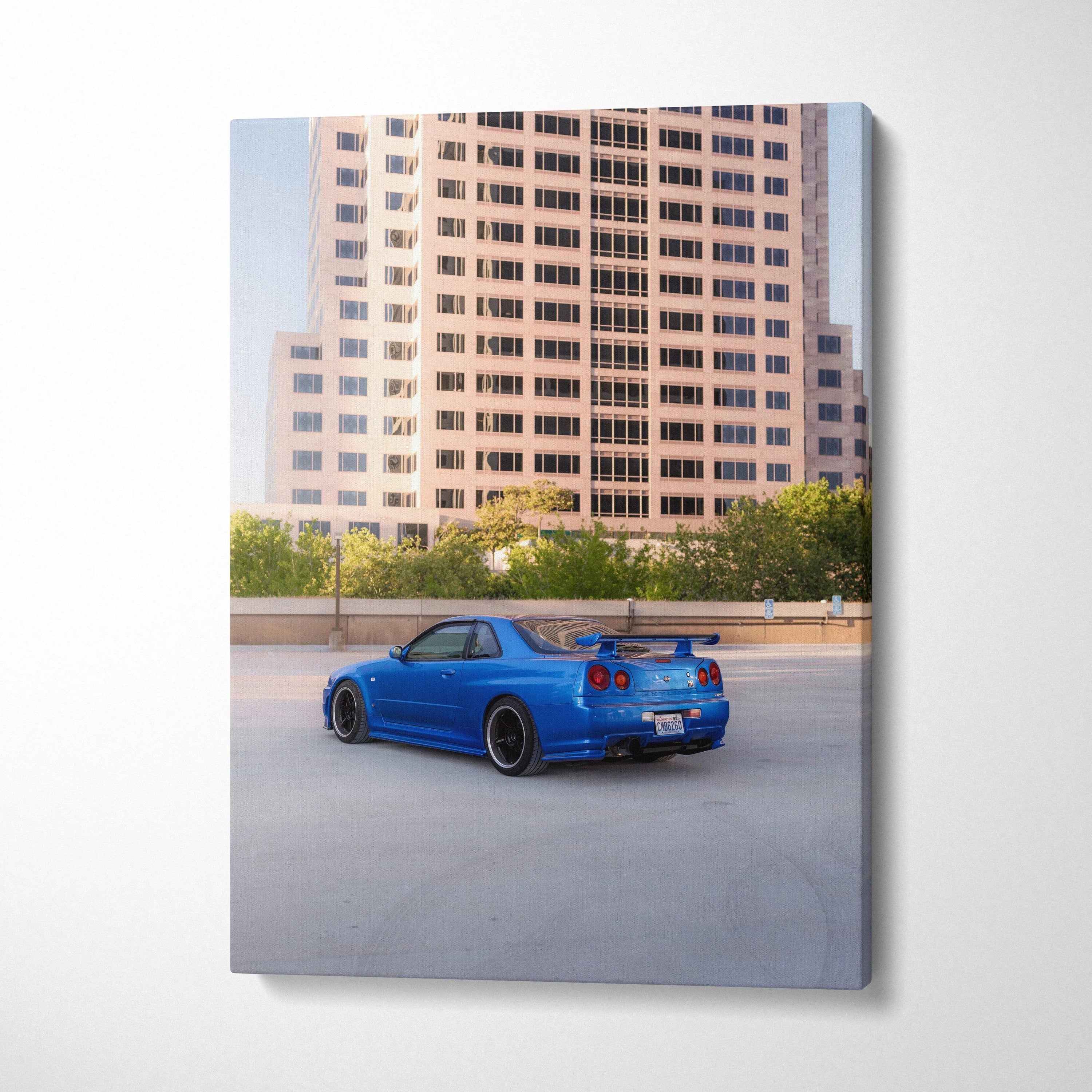 Blue Nissan R34 GTR parked on rooftop with cityscape background vertical canvas wall art.