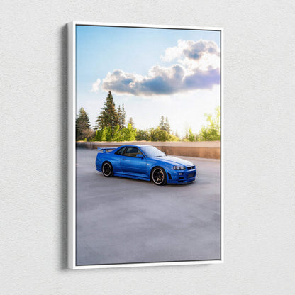 Blue Nissan GTR R34 Skyline parked under sky, vertical canvas wall art print.