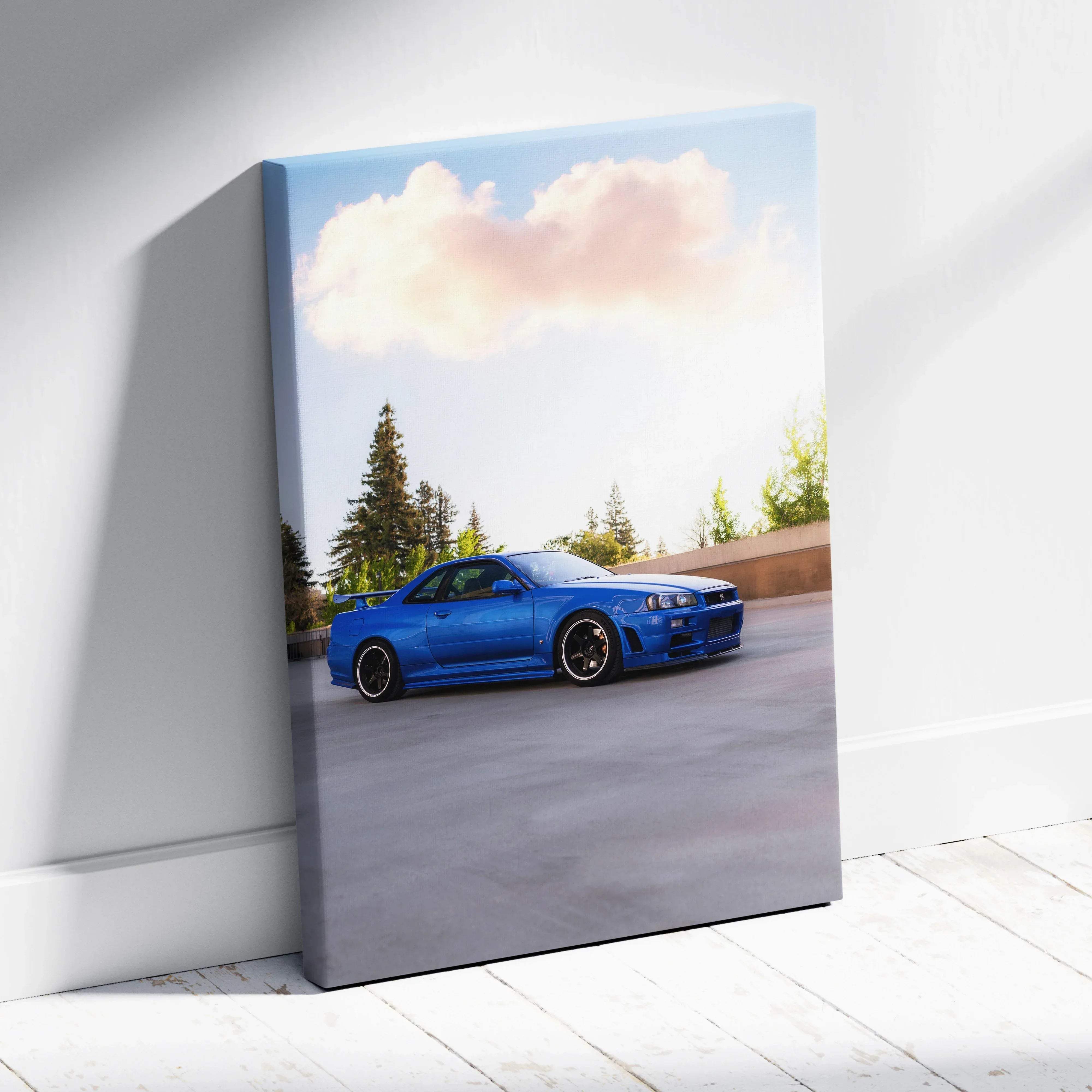 Canvas wall art featuring a high resolution vibrant blue Nissan Skyline R34 GTR modified sports car under cloudy sky