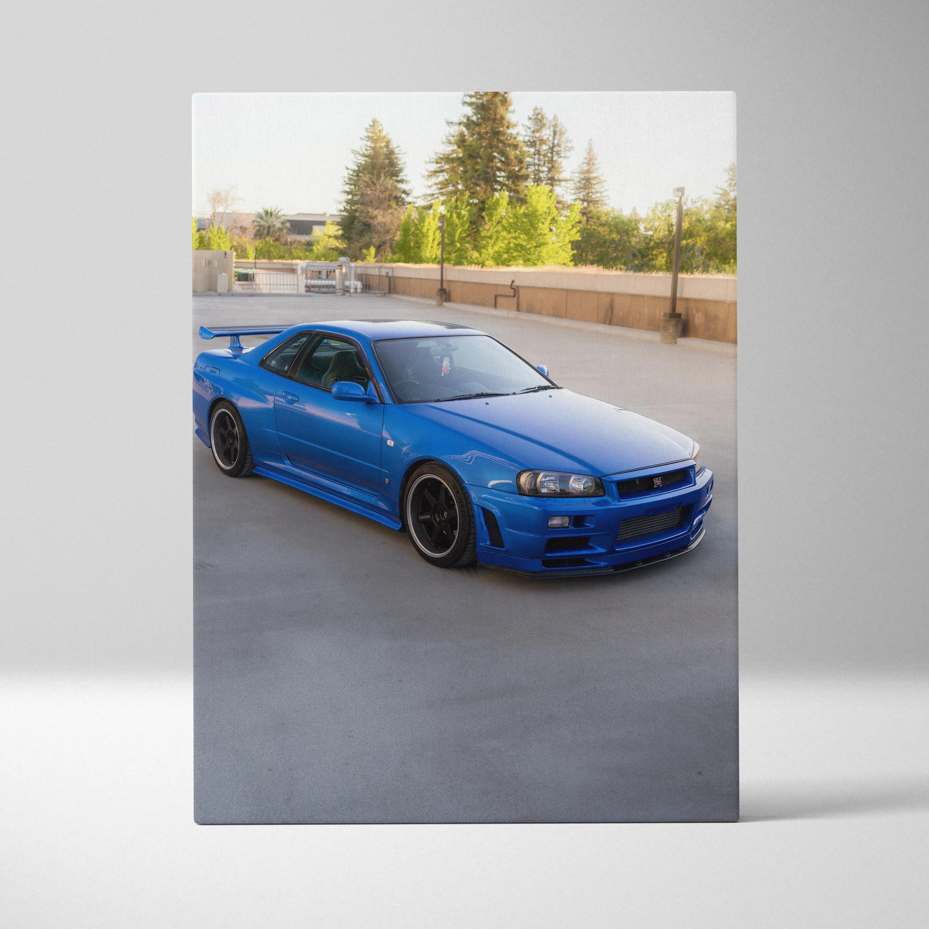 Blue Nissan R34 GTR sports car on canvas wall art with detailed high-resolution print.