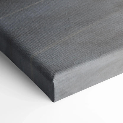 Close-up of gray canvas wall art texture and wrapped edges on vertical canvas print.
