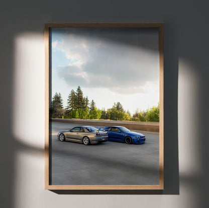 Nissan R34 GTR Skyline poster with two cars on road under cloudy sky wall art.