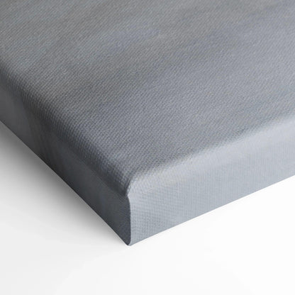 Close-up of gray textured canvas corner with museum-quality stitching for wall art display.