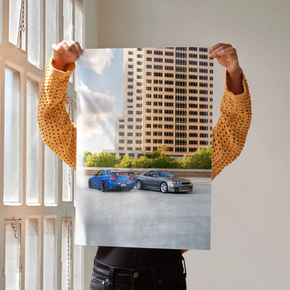 Poster showing Nissan R34 GTR Skyline cars in front of a tall urban building, wall art design.
