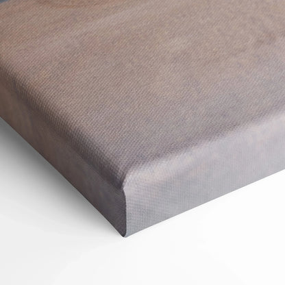 Close-up of gray textured canvas corner with tight, smooth wrapping for wall art and canvas art display.