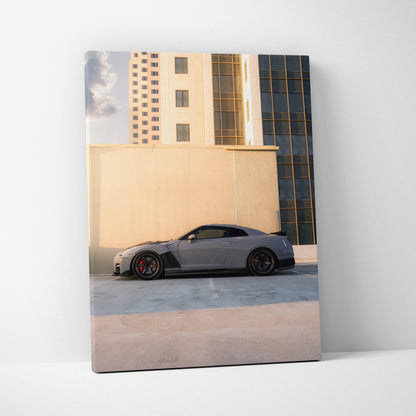 Nissan R35 GTR gray sports car against urban building backdrop canvas wall art.