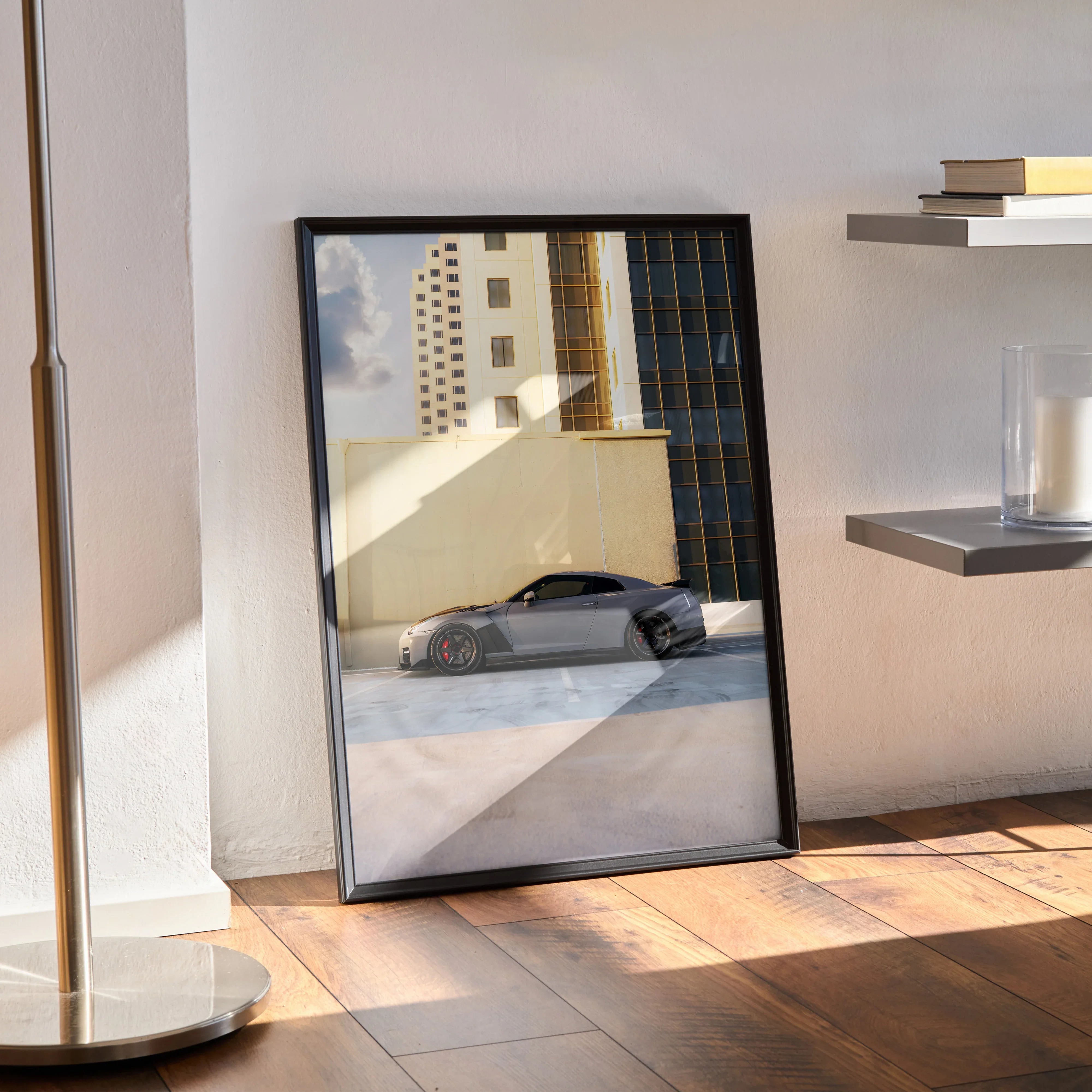 Nissan GTR R35 poster leaning on wall showcasing sleek sports car with city building background stylish wall art.