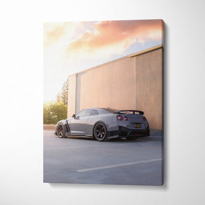 Nissan GTR R35 in sunset parking lot vertical canvas wall art with soft lighting and shadow.