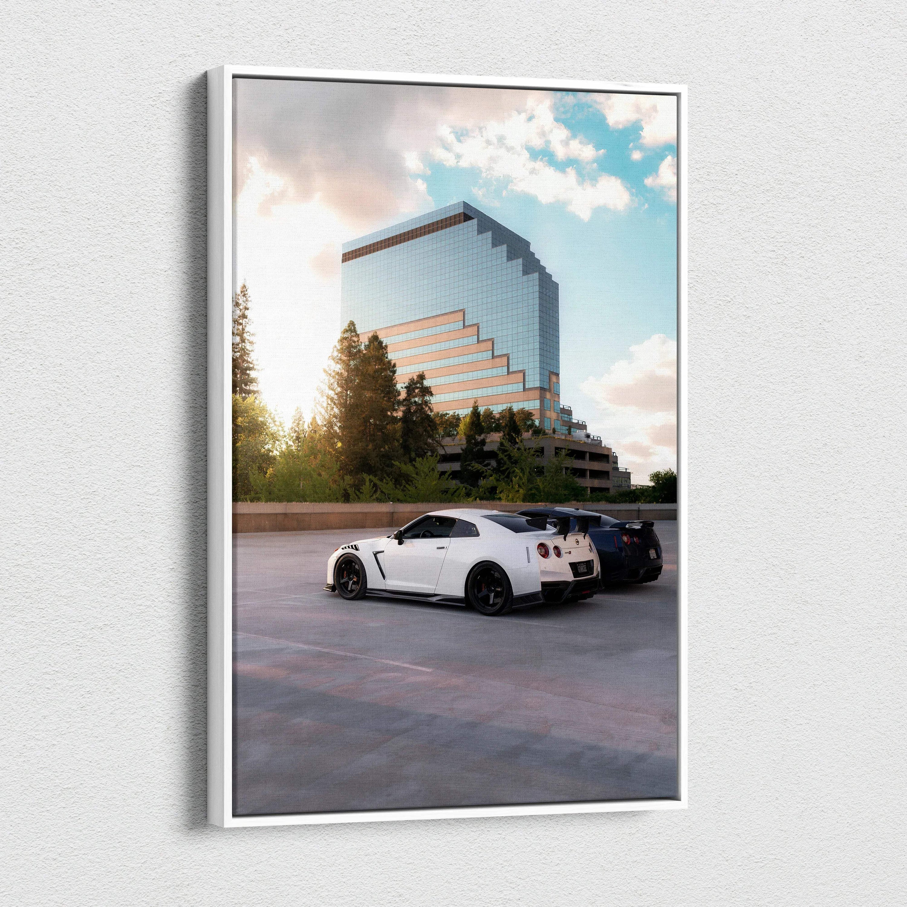Nissan GTR R35 parked in front of geometric building with blue sky canvas wall art.
