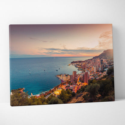 Canvas wall art featuring a colorful coastal cityscape at sunset with buildings and ocean.views.