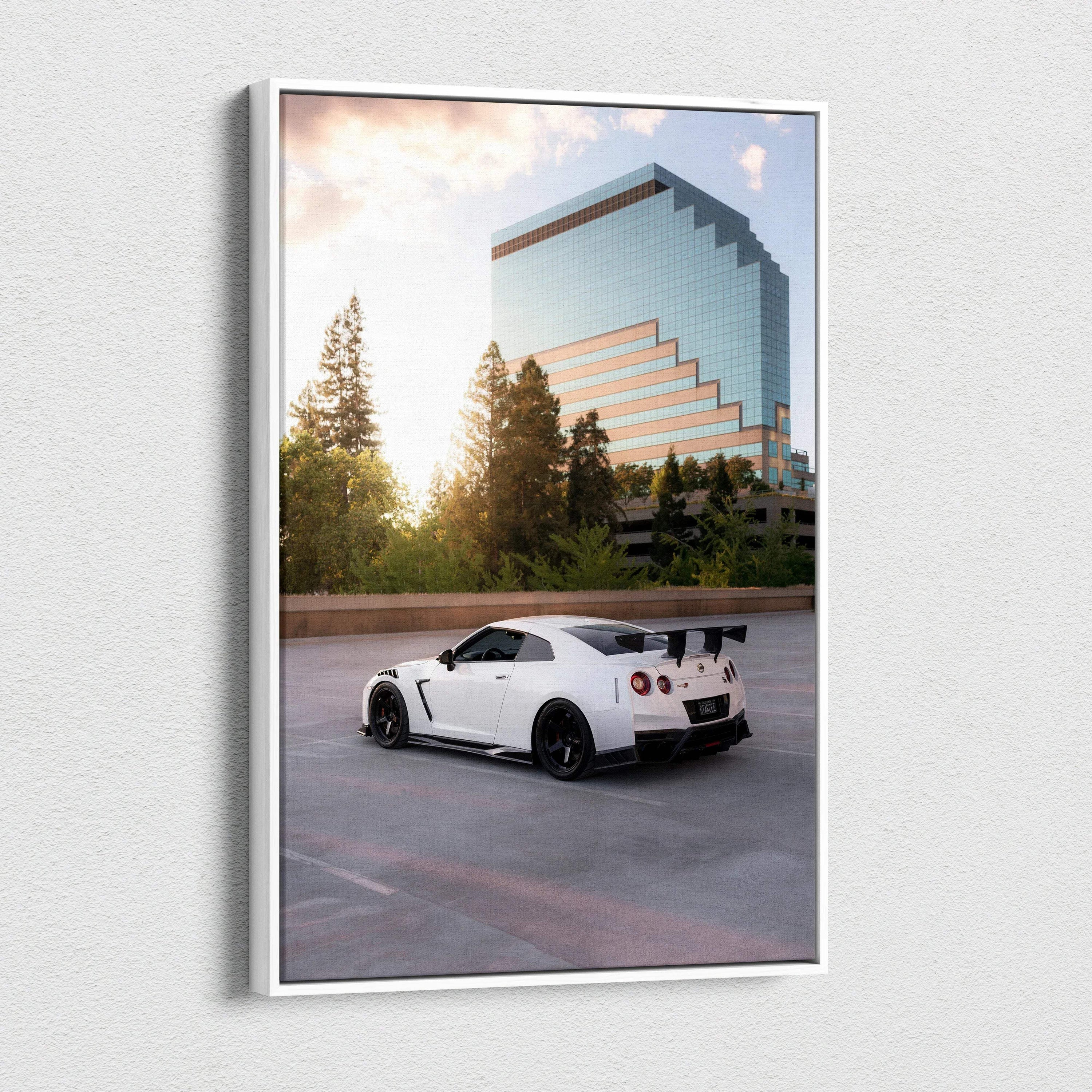 White Nissan GTR R35 parked near trees and modern glass building vertical canvas wall art.