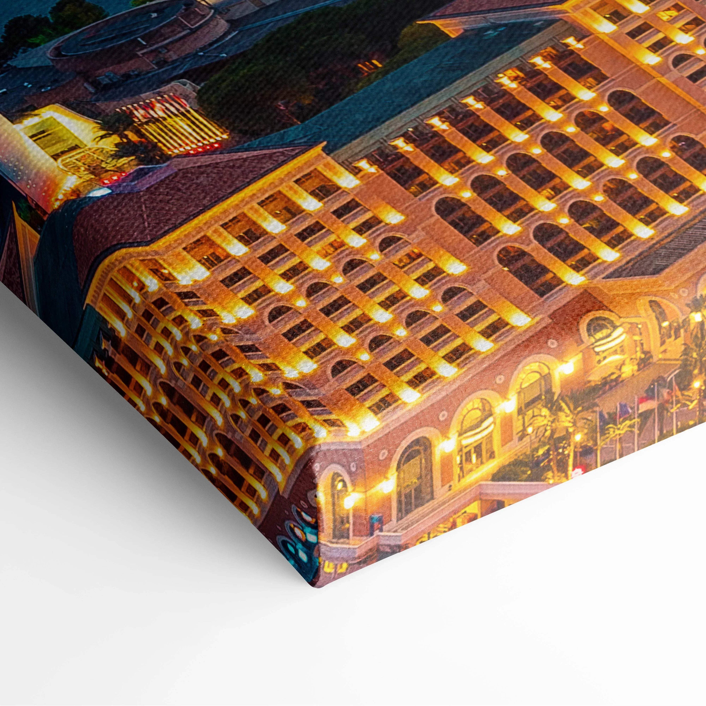 Canvas wall art print featuring illuminated detailed architecture with warm yellow and orange tones.
