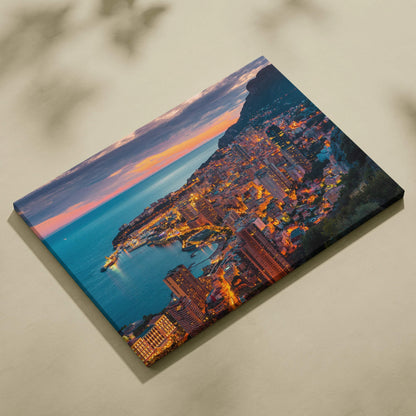 Canvas wall art featuring a vibrant cityscape with illuminated buildings at dusk and a nearby coastline.