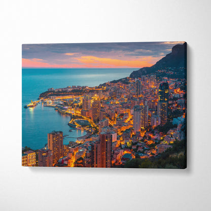 Canvas wall art featuring vibrant cityscape at dusk with illuminated buildings and ocean view.