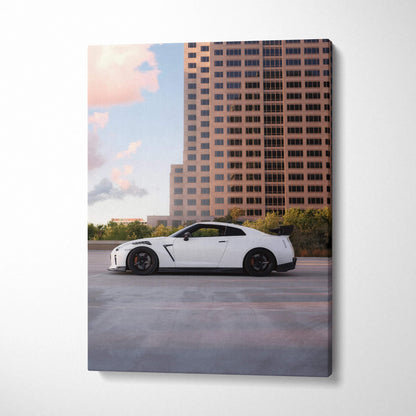 Nissan GTR R35 white sports car against city skyline canvas wall art print in vertical format.