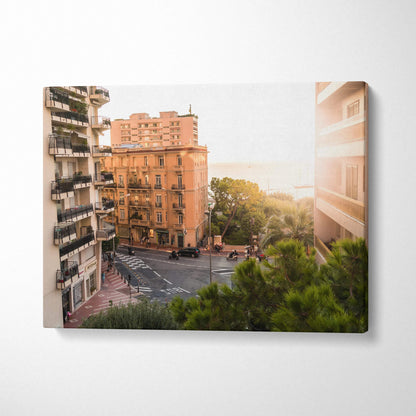 Canvas wall art featuring warm-toned urban architecture and sunlit cityscape with greenery in foreground.