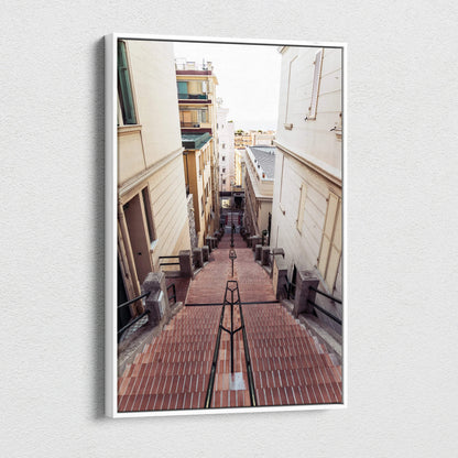 Vertical canvas wall art featuring a narrow urban alleyway with warm-toned buildings and stairs leading downward.