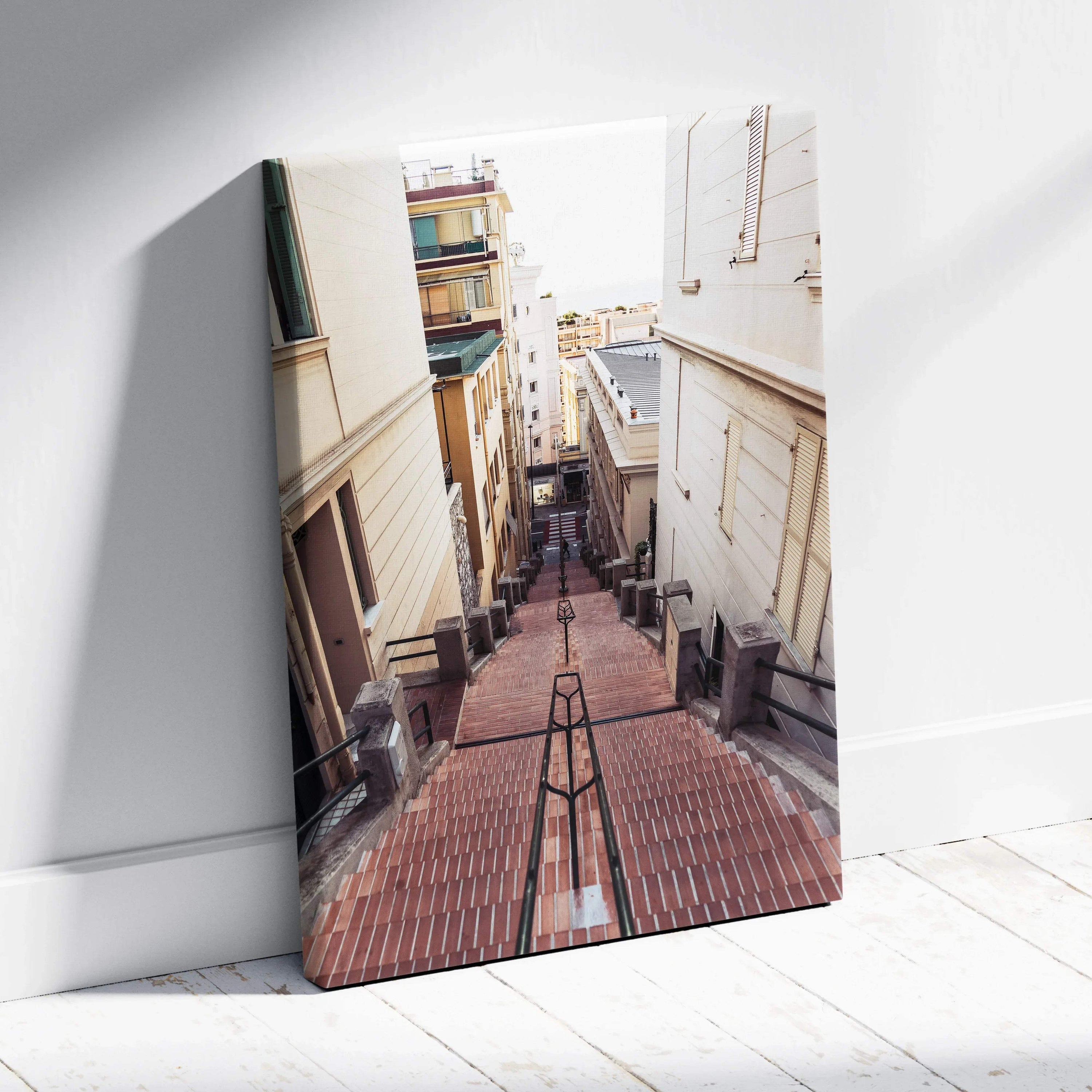 Canvas wall art featuring a narrow brick stairway between beige buildings in soft natural light.