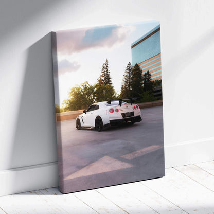 Nissan R35 GTR sunset scene vertical canvas wall art with modern building and trees.