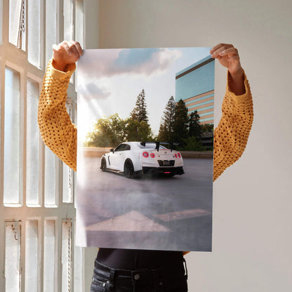 Nissan GTR R35 white car parked near trees and building at sunset poster wall art.
