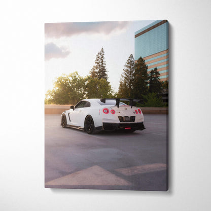 Nissan GTR R35 white car at sunset canvas wall art with urban background.