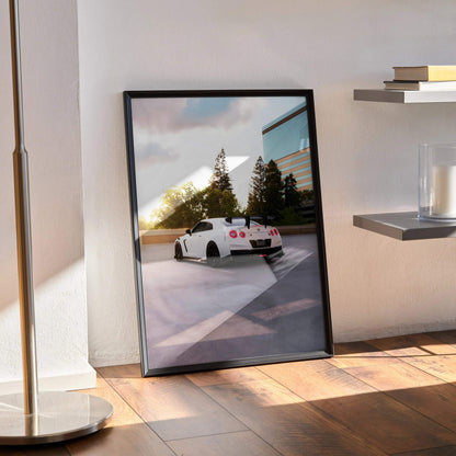 Nissan GTR R35 poster wall art featuring the car at sunset by modern building.
