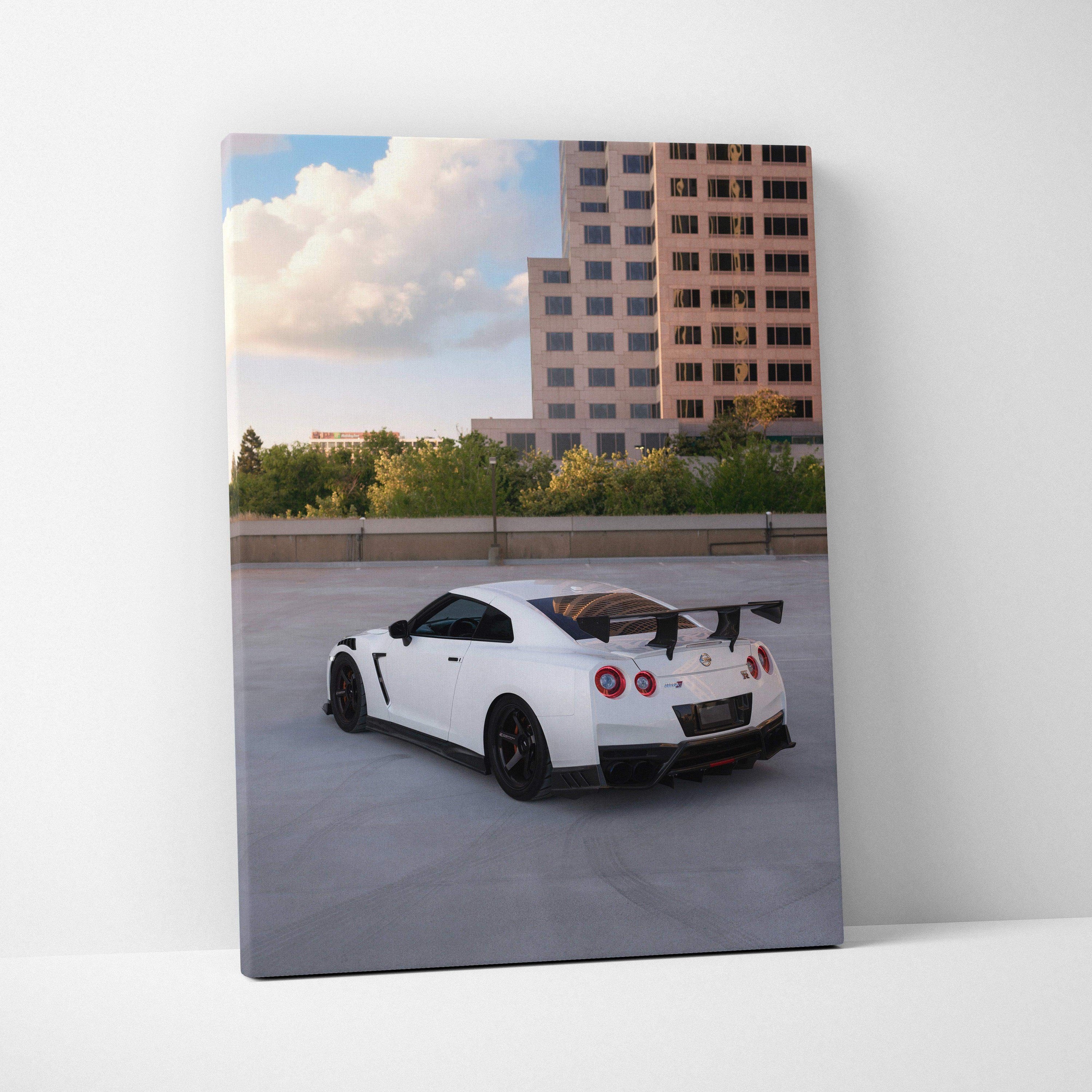 Nissan GTR R35 white sports car on rooftop parking canvas wall art vertical print.