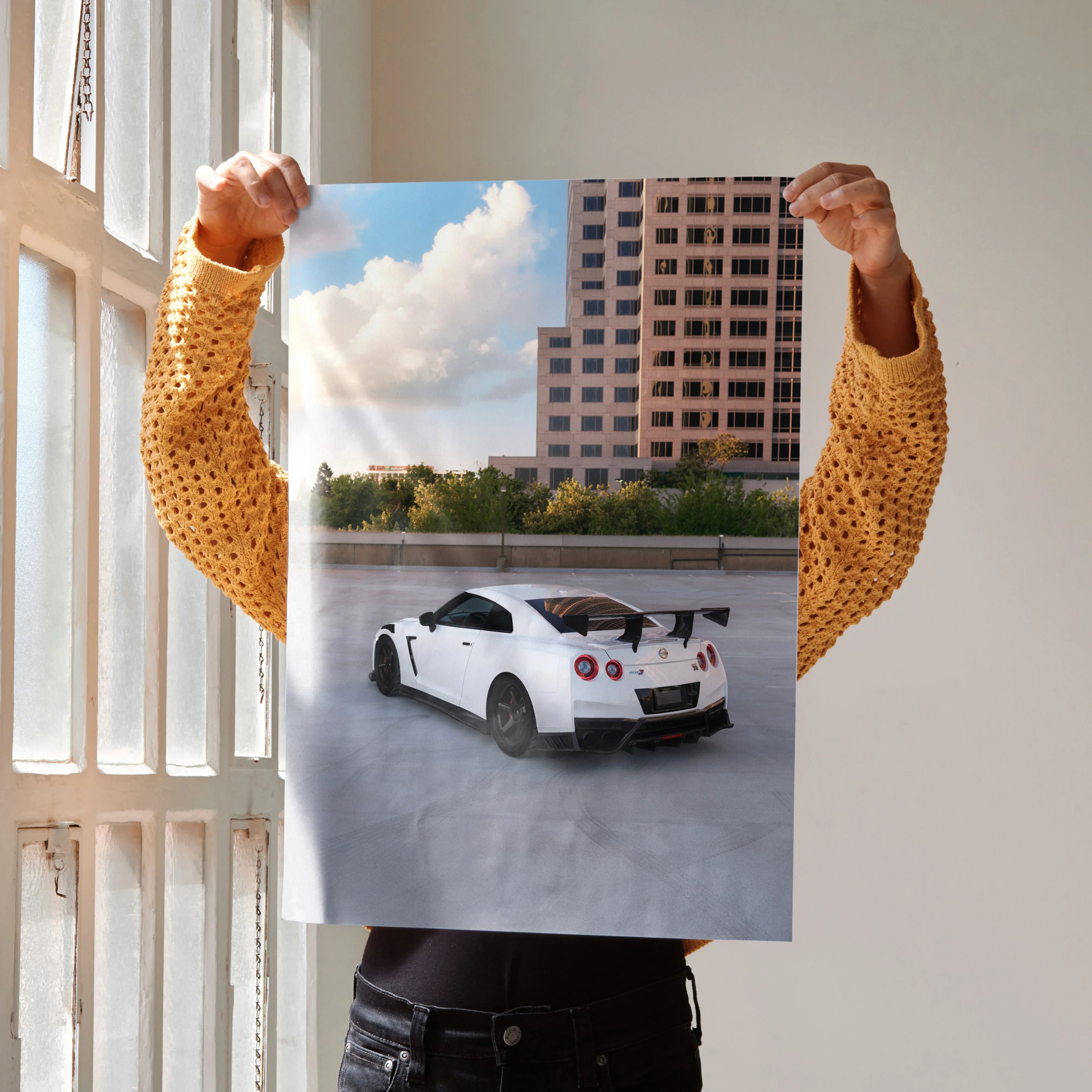 Nissan GTR R35 white sports car poster with city skyline background wall art.