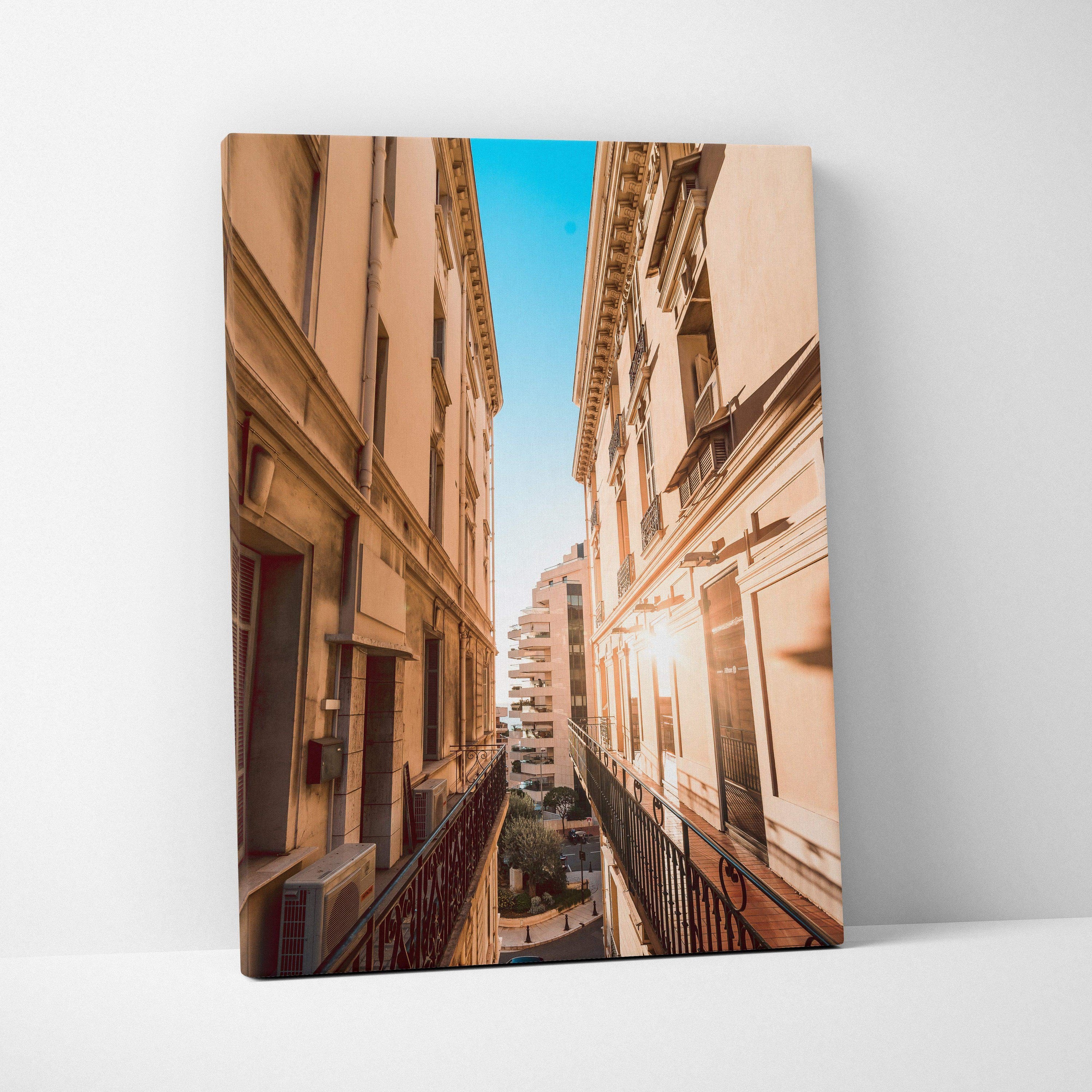 Canvas wall art featuring a high-resolution urban architecture scene with beige buildings and a bright blue sky.