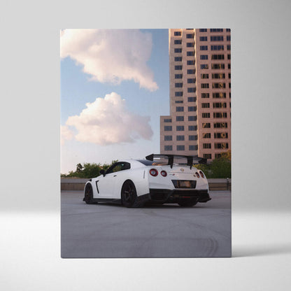White Nissan GTR R35 parked on rooftop with building background vertical canvas wall art.