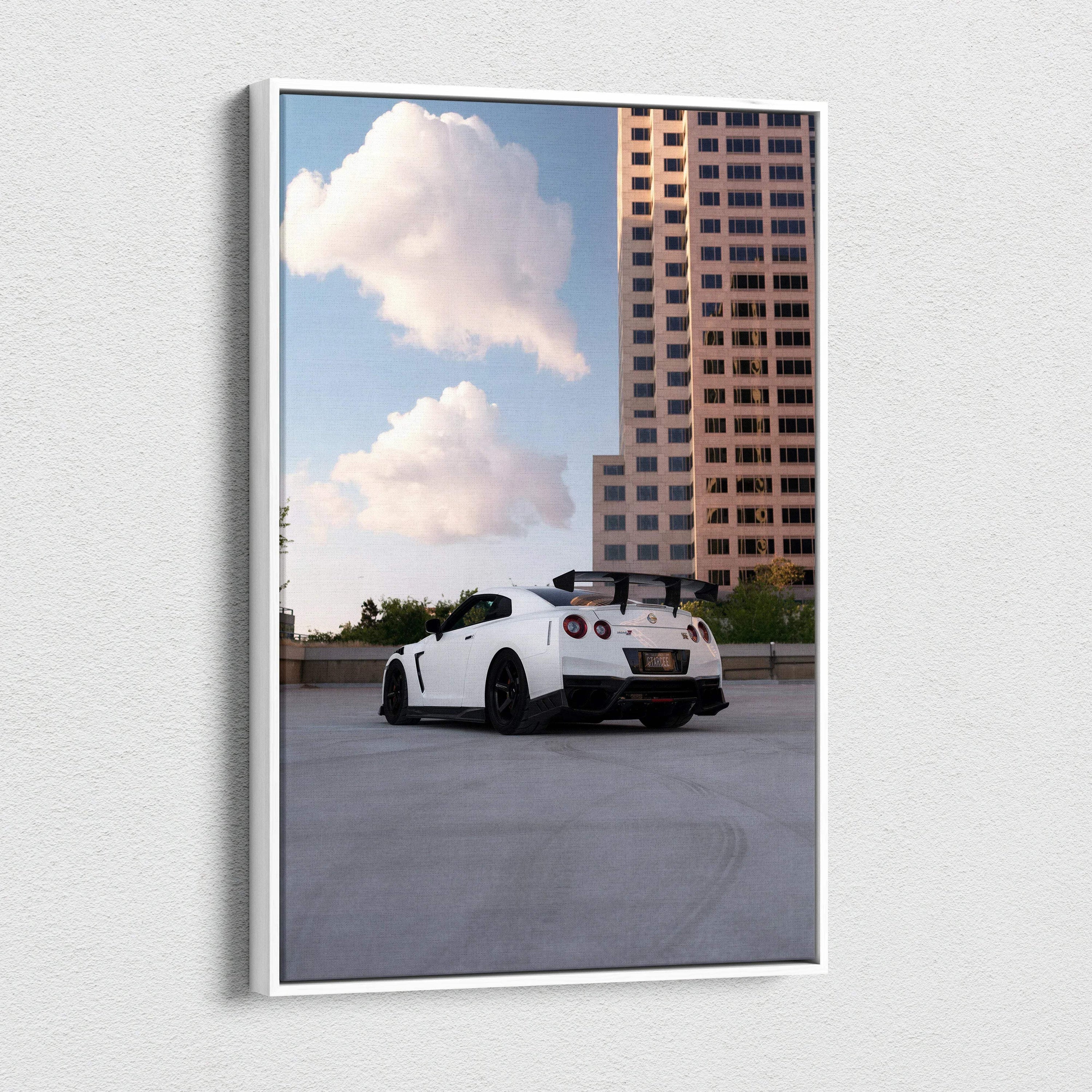Nissan R35 GTR parked on rooftop with city buildings in background vertical canvas wall art.