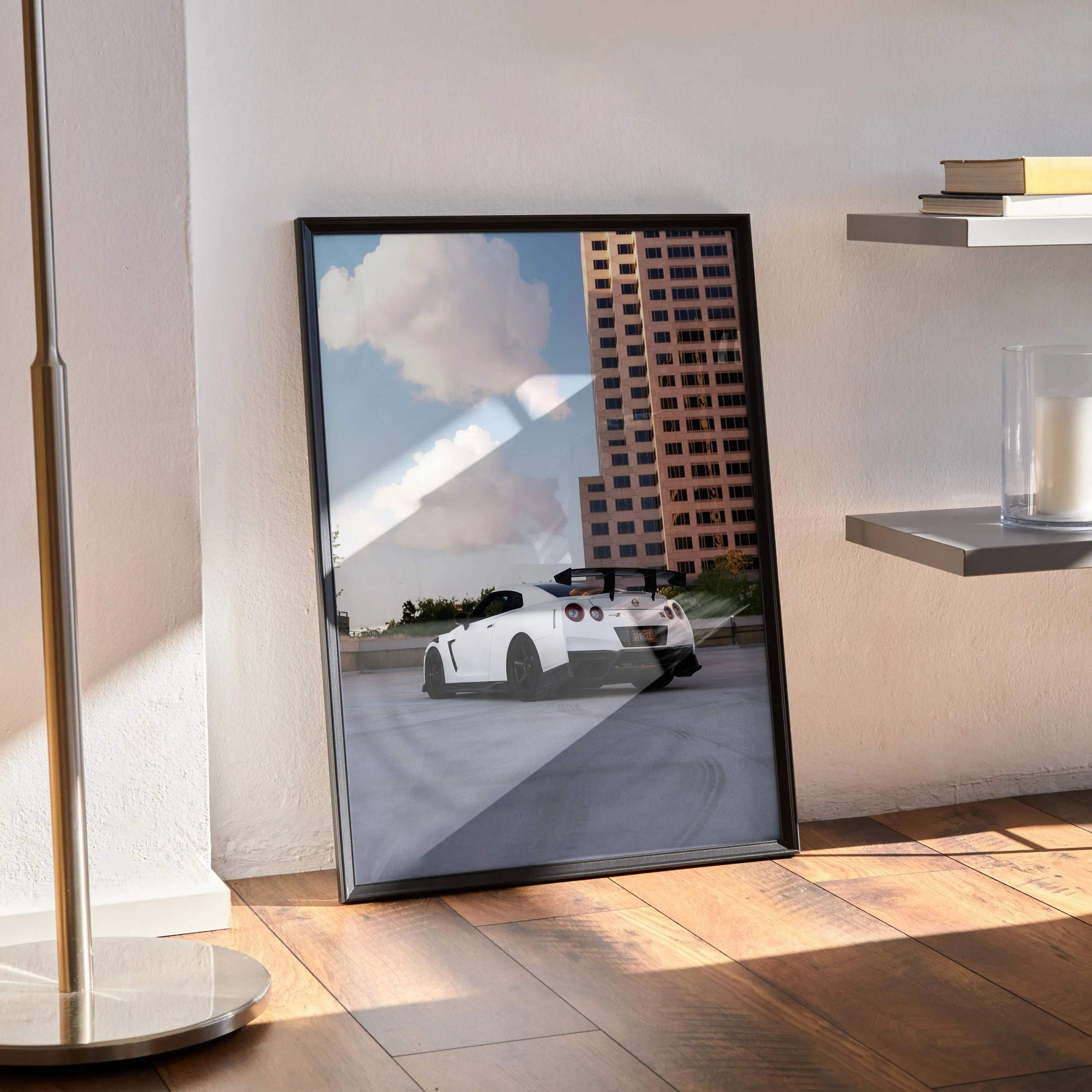 Nissan GTR R35 high-resolution poster showing white sports car in urban setting, sleek wall art.