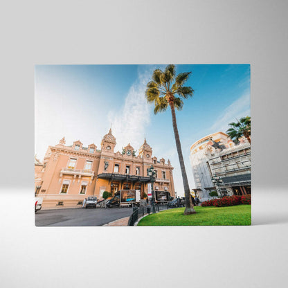 Canvas wall art featuring a digital print of a peach-colored historic building with ornate architecture and tall palm trees.